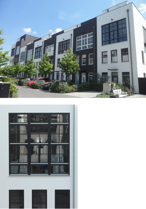 Eigentumswohnanlage in Berlin Stralau, mit  Atelierfenstern (schwarz/weiß) und Markisoletten